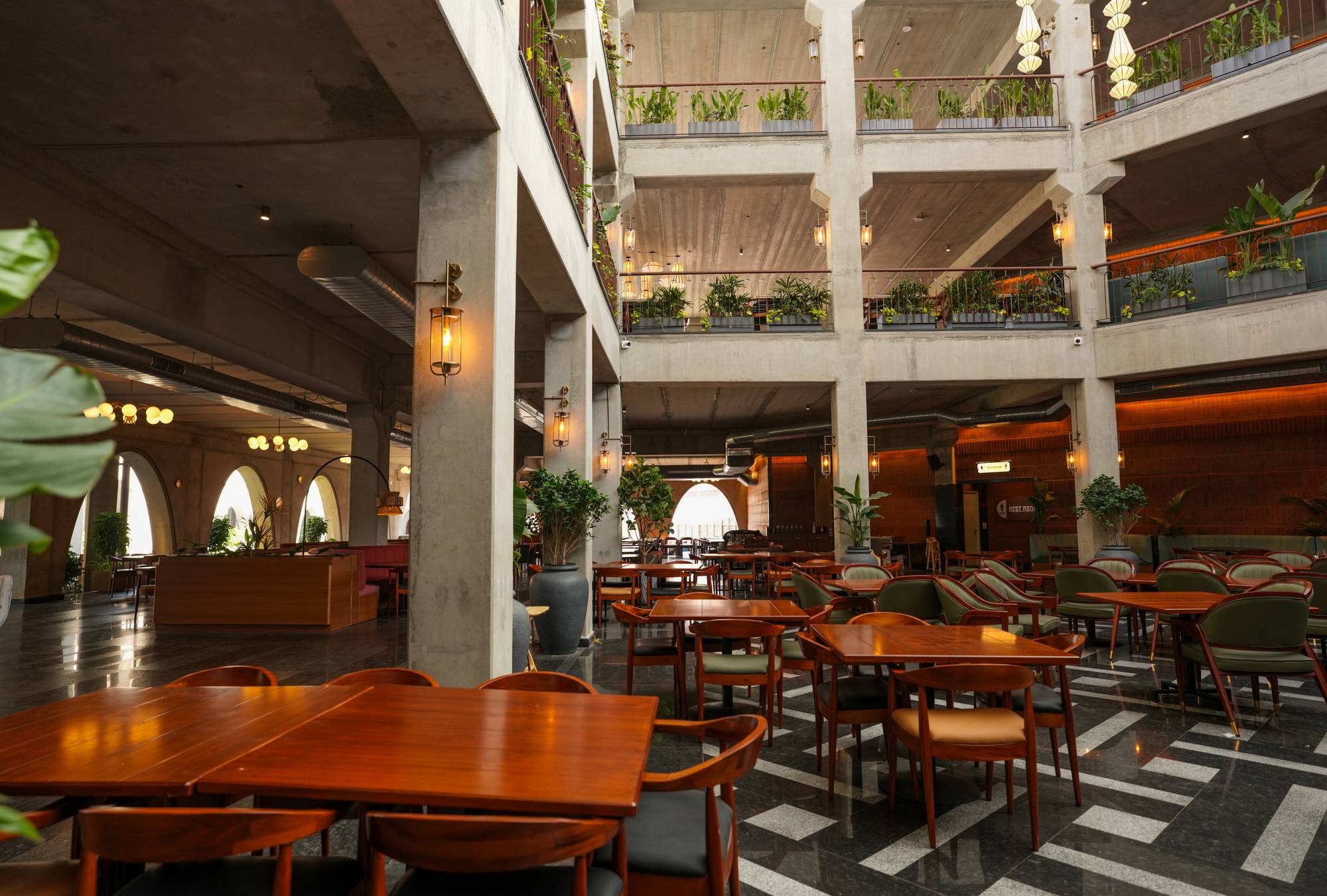 Ground floor of the atrium set up for a private event at Legacy Brewing Company