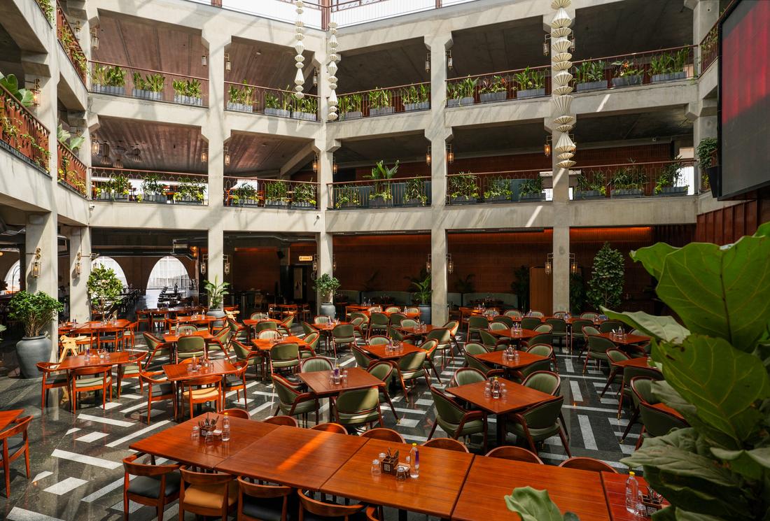Corporate gathering space in the grand atrium at Legacy Brewing Company