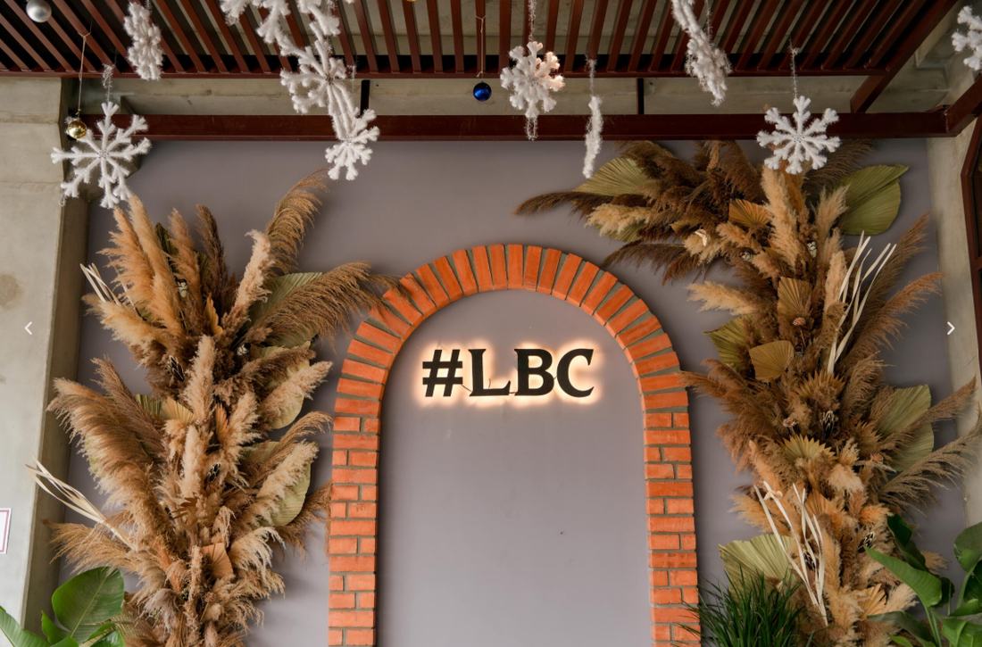 The #LBC photo arch at Legacy Brewing Company's guest experience courtyard